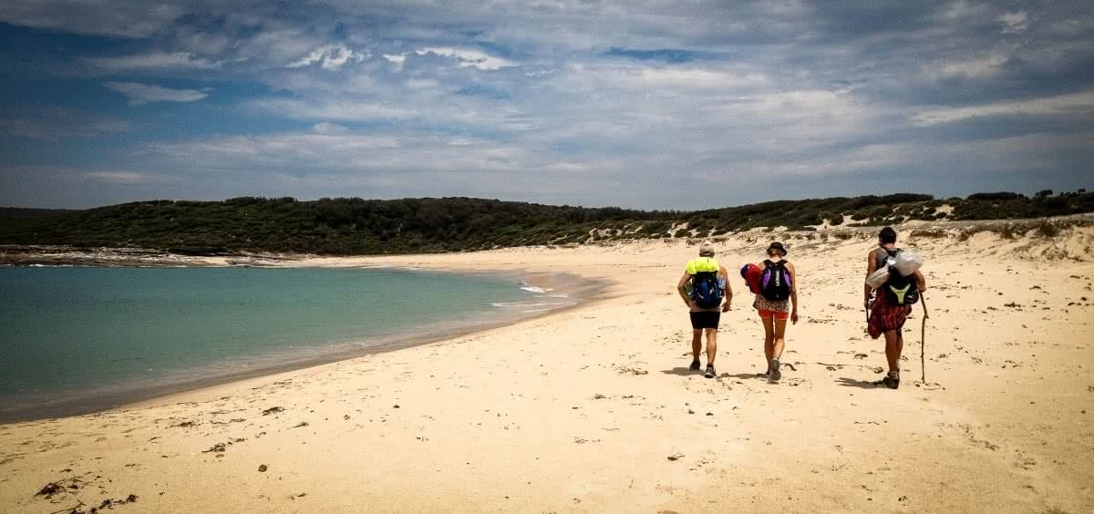 Top 6 Sydney Camping Escapes (by Public Transport), Henry Brydon, Royal National Park, beach, hikers, ocean, sand, sky