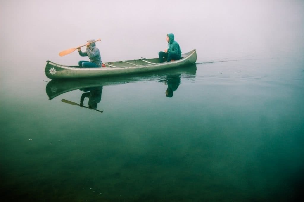 Top 6 Sydney Camping Escapes (by Public Transport), Henry Brydon, Royal National Park, hammock, couple, still water, green, grey, waterproofs, paddle, canoe