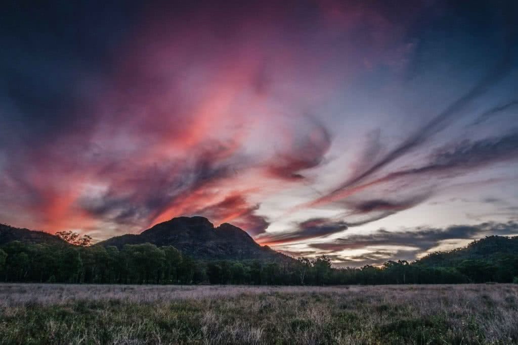 5 Epic NSW National Parks You've Probably Never Heard Of Tim Ashelford Warrumbungle National Park, Harrison Candlin, Split Rock, NSW, sunset