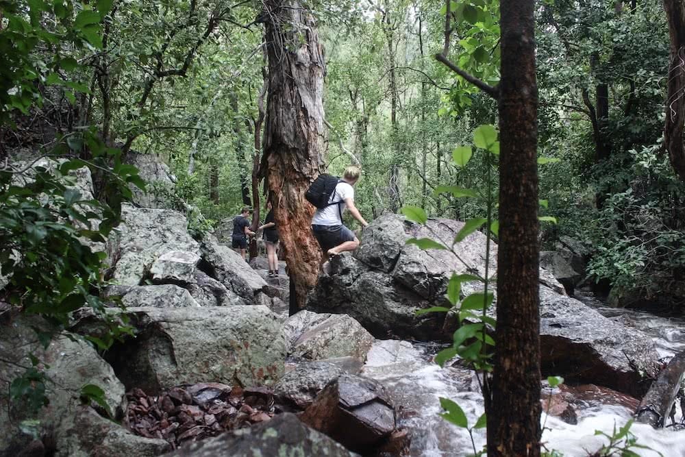 jack hunt robin falls northern territory, boulders, tree, scrambling, man