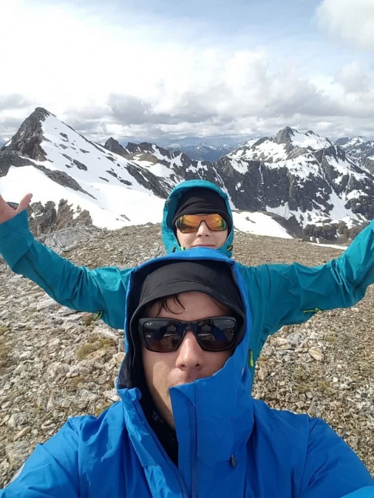 The Hardest Hike in New Zealand // Dusky Track, Tim Ashelford, photo by mitch stewart, selfie, snow, mountains, sunglasses, raincoats