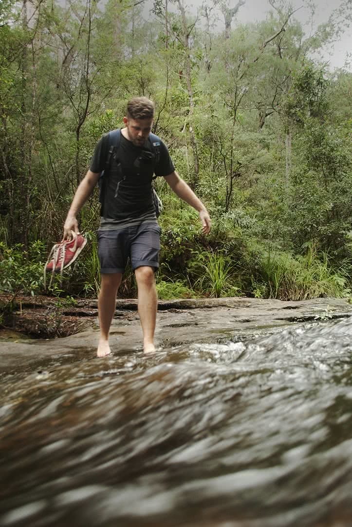 Jamie crossing Kariong Brook Falls Wondabyne Station public transport Matt 'n' Kat Pearce waterfall river crossing