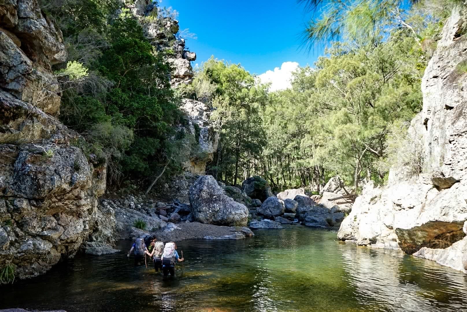 Katie Marston, Benny Littlejohn, Green Gully Track, Oxley Wild Rivers National Park, NSW, multi-day hike, hut to hut, descending, walking sticks, crew