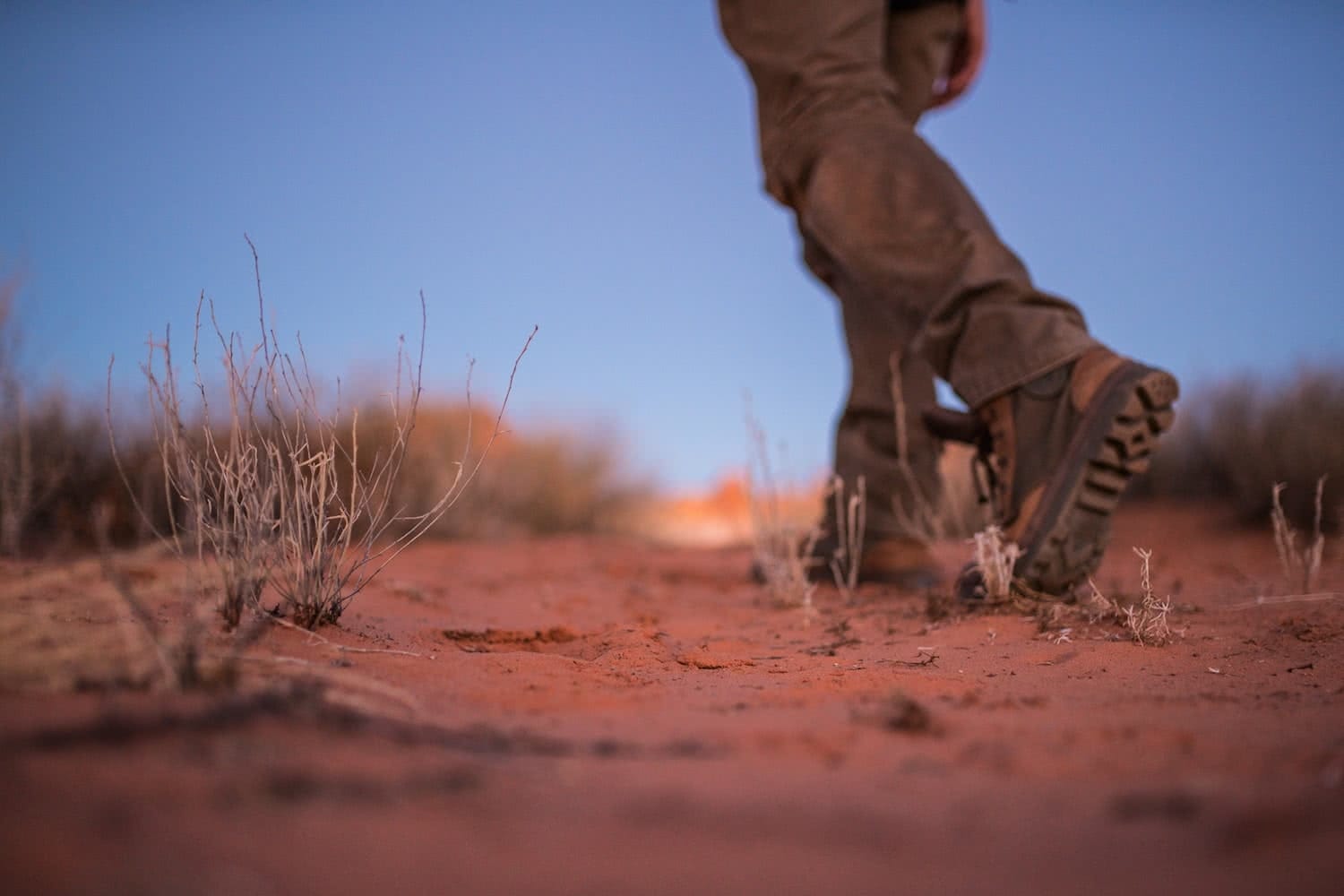 outback way rob mulally man walking in desert