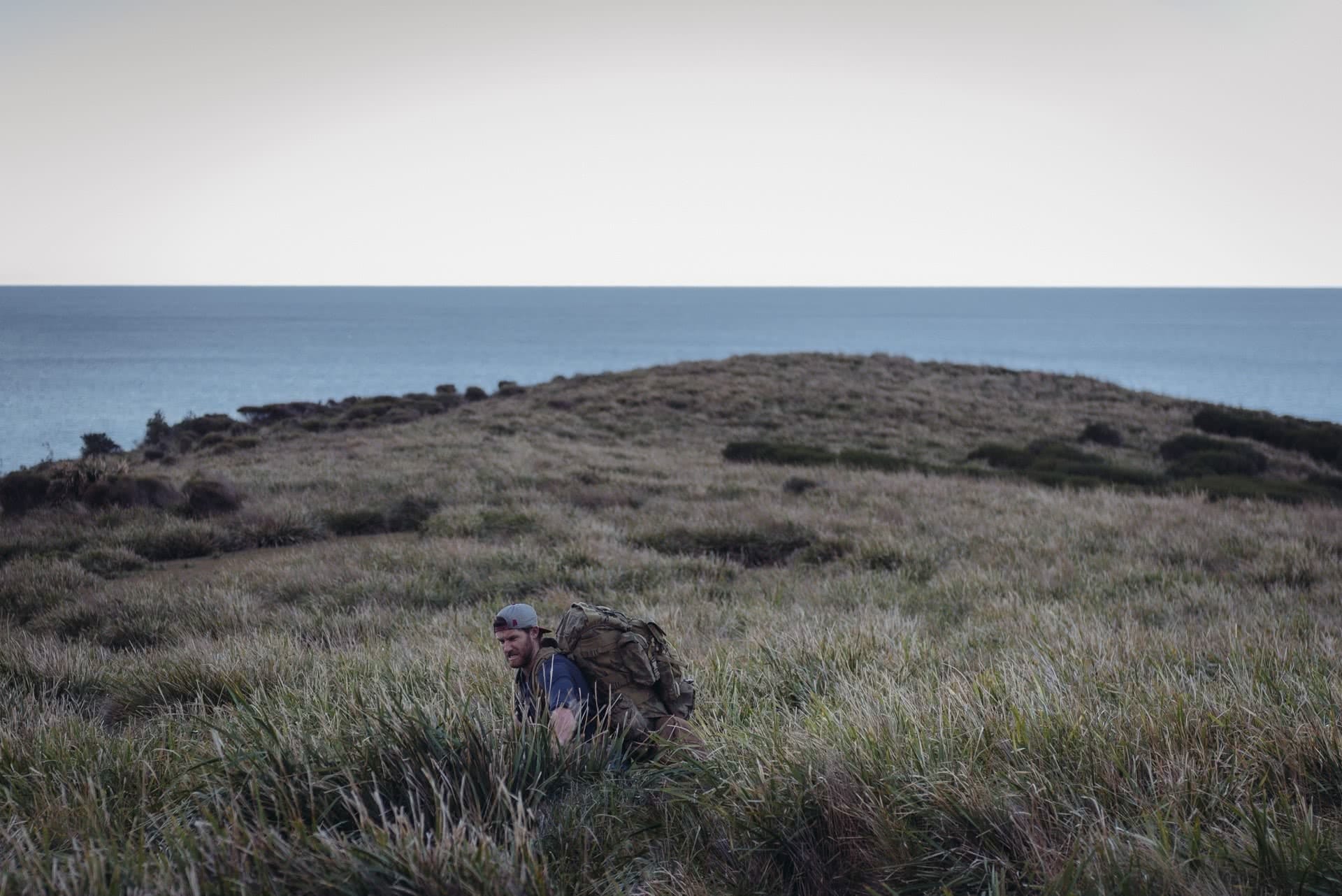 Adrian Mascenon adventuring alone grassland