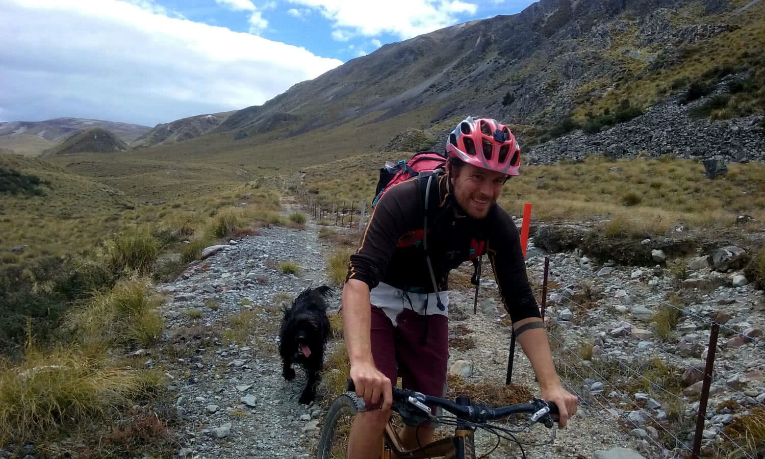 Oshy Dog Tails Hakatere Conservation Park Ian Biking to Mystery Lake Ian Middleton, bike, man, trail, hillside