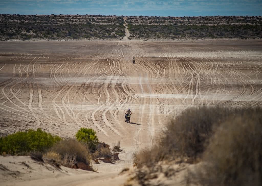Benny Littlejohn, Simpson Desert Crossing, Adventure Co, fatbikes, mountain bike, cycling, desert plain, salt pan