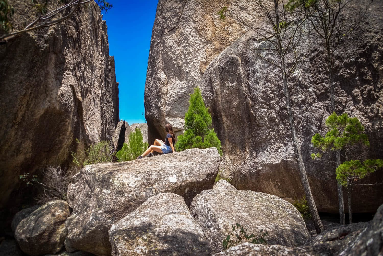 Lisa Owen_Best Intermediate Hikes Near Brisbane_Girraween, rocks, woman, sitting