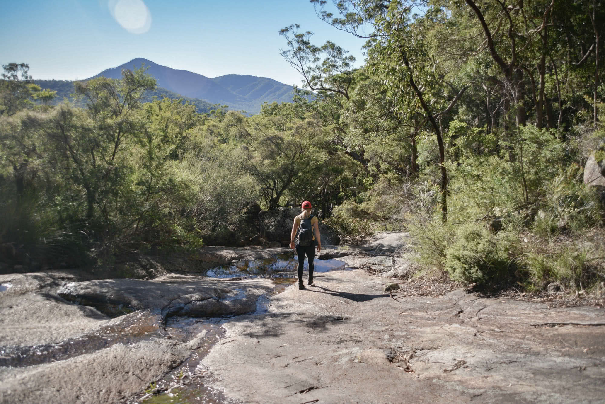Lisa Owen_LowerPortals and Barney Waterfall_Moonlight Slabs, person, walking, hiker, bush, rocks