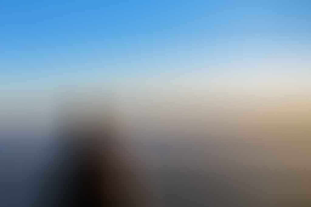 WAE_Sunrise View over to Lamington National Park Why I wake Up At 2am Every Weekend Lisa Owen, woman, bobble hat, down jacket, clouds