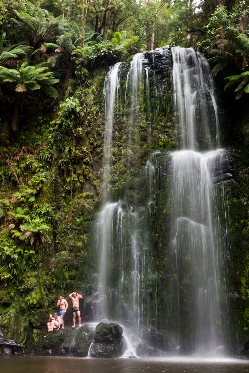 8 Ridiculously Beautiful Victorian Waterfalls To Chase This Summer Pat Corden Beauchamp Falls, waterfall, swimmer, cliffs, ferns