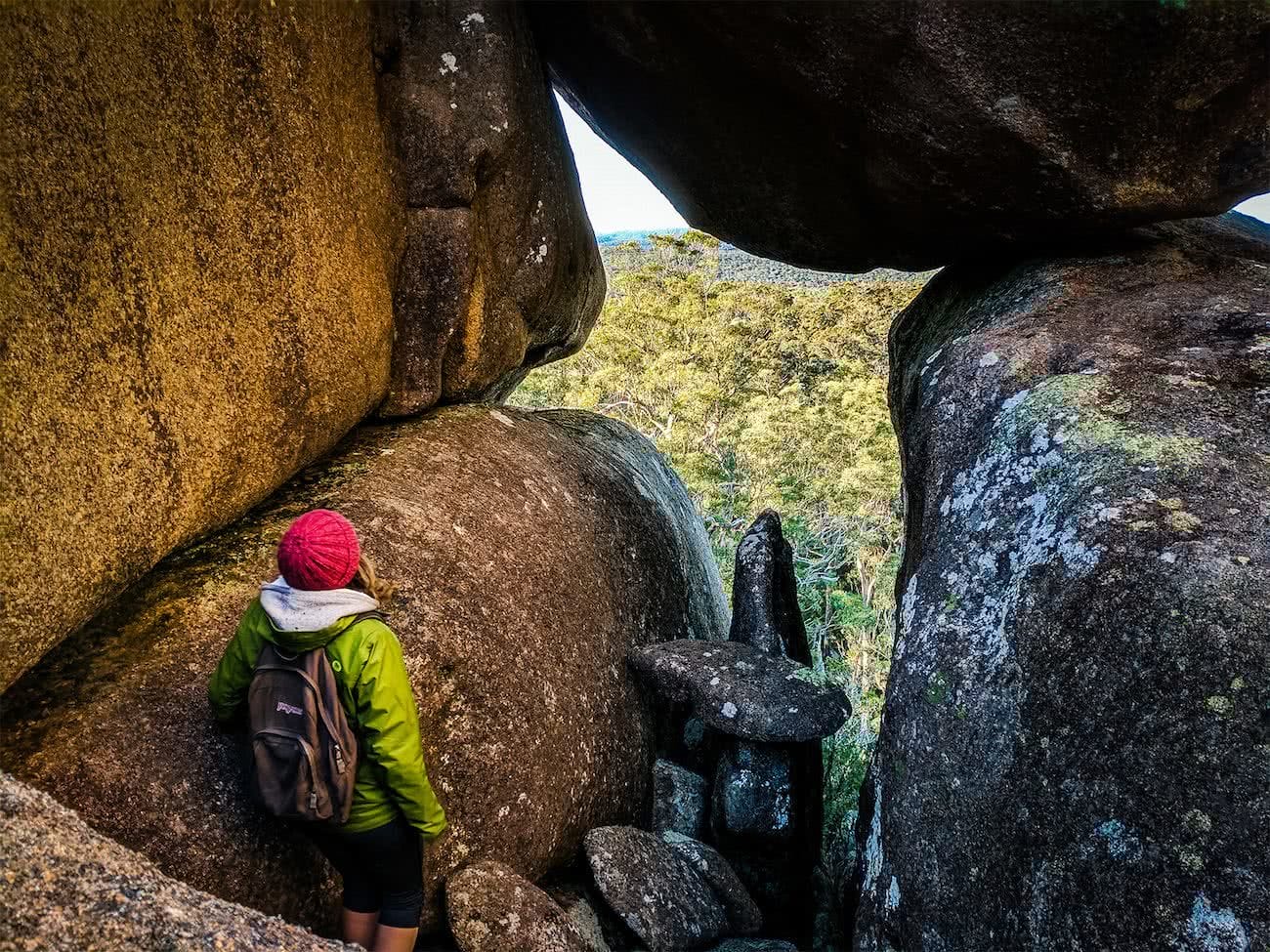 A Maze Of Balancing Boulders // Cathedral Rock National Park (NSW) Luke Mallinson, opening, hiker, red beanie, framed view, trees,