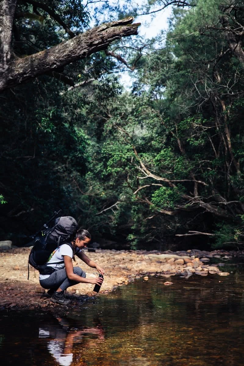 Shoalhaven Into the Wild Low Res-60 Henry Brydon, hike, woman, creek, forest, pack