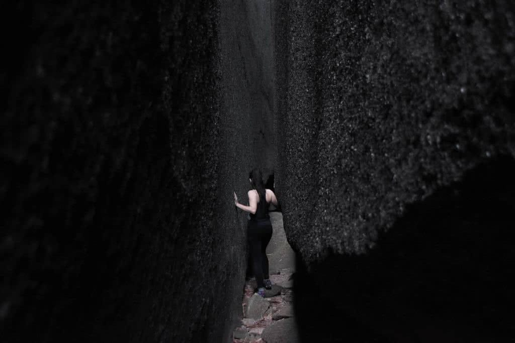 Picnics And Secret Passageways // Mt Norman (QLD), Lisa Owen, WAE_MtNorman_Crevice, crack, woman, path, walls,