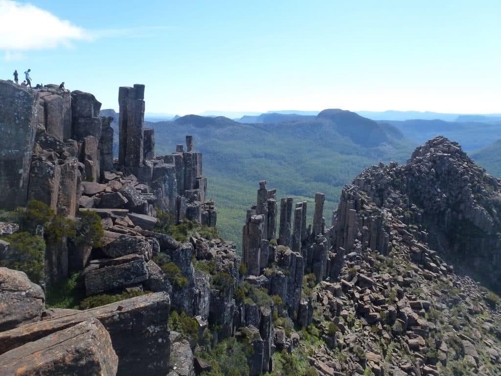 Highlights Of The Overland Track (VIC) The Acropolis - Sarah Barlow, rock formations, columns, group of hikers, rest stop with a view