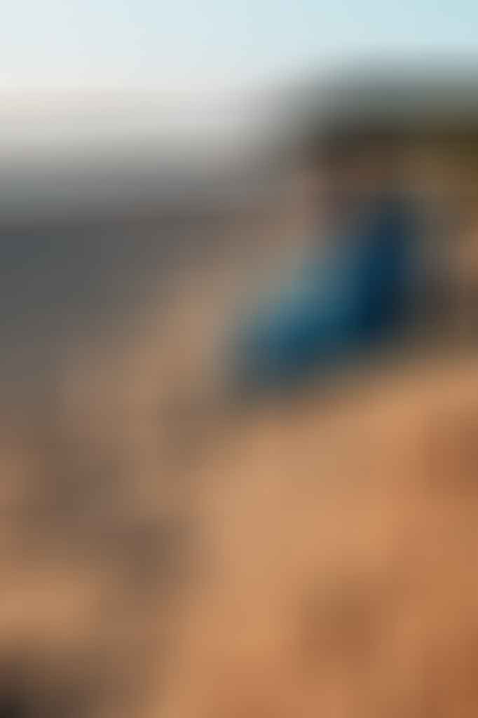 Blackwolf Hiker 500 Sleeping Bag // Gear Review, Caleb Hindley, woman, blue, hat, beach, ocean, waves, view, looking out