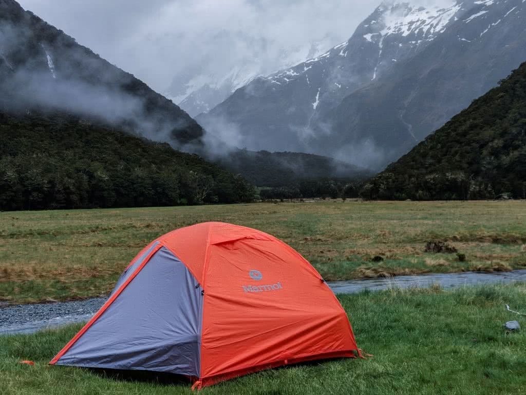 Soggy, Snowbound And Stoked // Routeburn Track (NZ), Rachel Dimond, Day 1 - Routeburn Flat campsite, tent, mist, low cloud, mountains, river