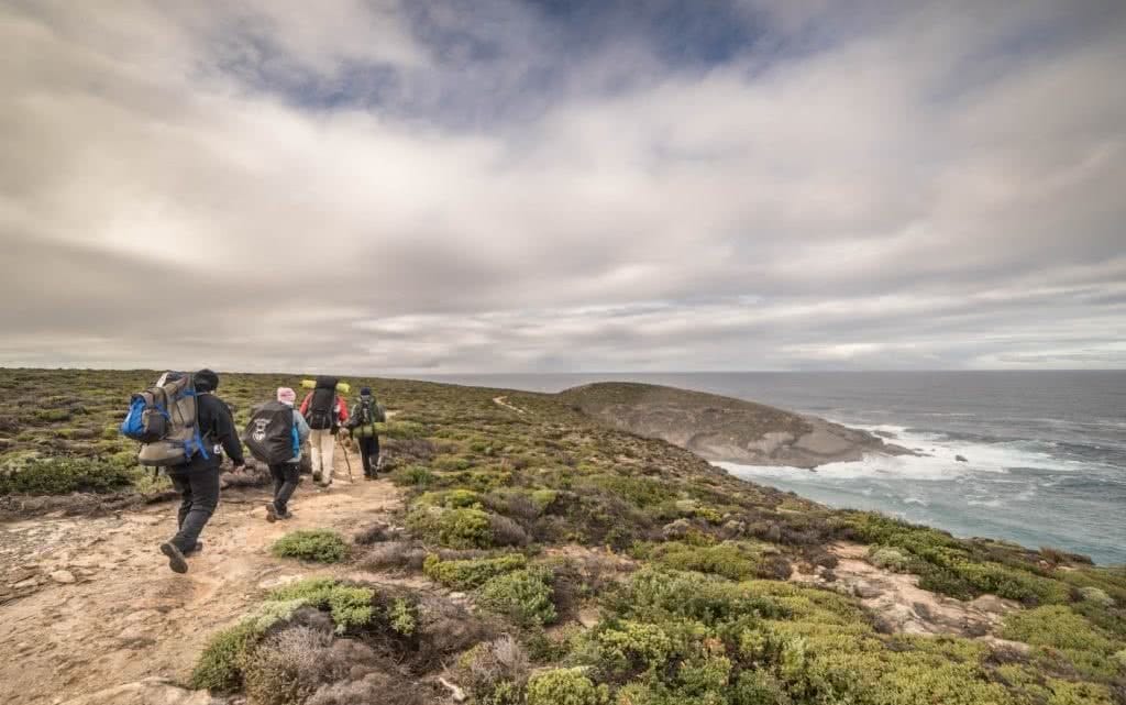 How Not To Hike (I Learned The Hard Way), Saphira Schroers, walk in a pack, together, team, crew, hikers, clouds, coast path, ocean view