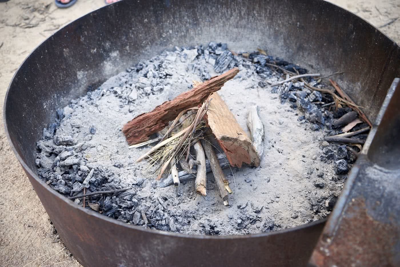 How To Make An Awesome Campfire Without Matches, photo by Neil Massey, fire, wood, sticks, fire pit