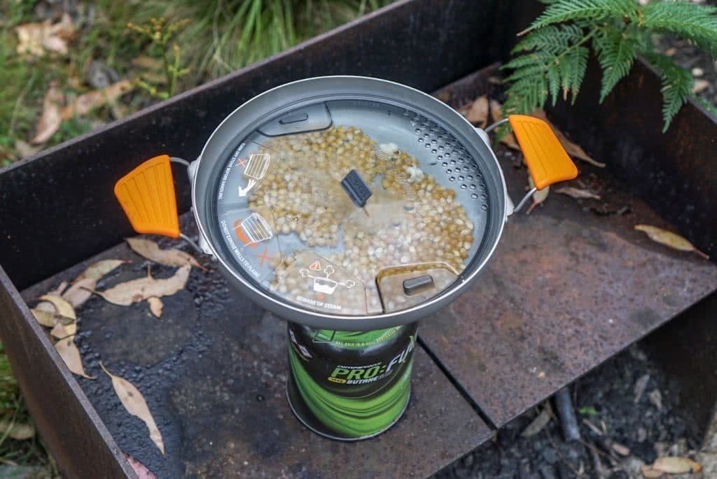 Food is Fuel // A Guide To Healthy Eating In The Wild, Amelia Gillies, popcorn, camping stove, wok, pan, lid