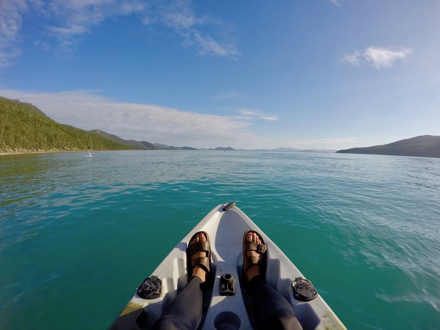 Camping The Whitsundays // Cairn Beach Campground (QLD), Solaye Snider, canoe, Birkenstocks, legs, feet, water