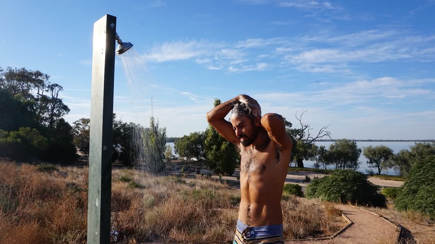 Troopy Travels // Chasing Sunsets From Byron Bay To The Ningaloo Reef, Alice Forrest, Lake Benanee, SA, shower, nature, wash, clean