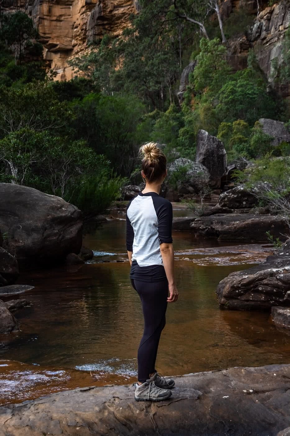 Layering For The Aussie Winter, Brooke Nolan, photo by Matt Pearce, swimming hole, long-sleeved shirt, bush