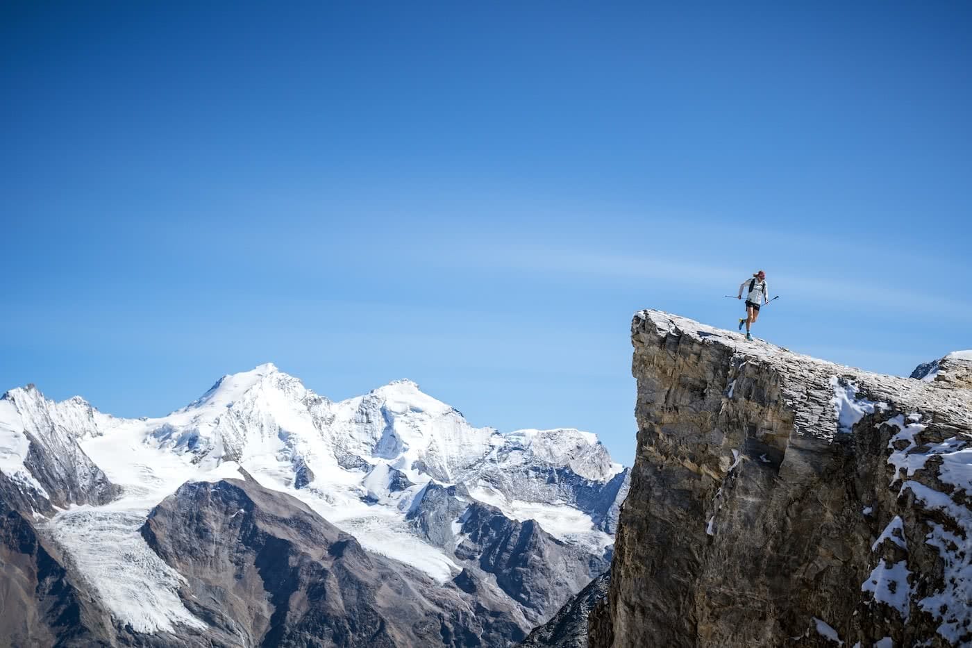 Runner Guy // An Interview With Trail Runner Joe Grant, Photo by Dan Patitucci, snow, mountain, clifftop