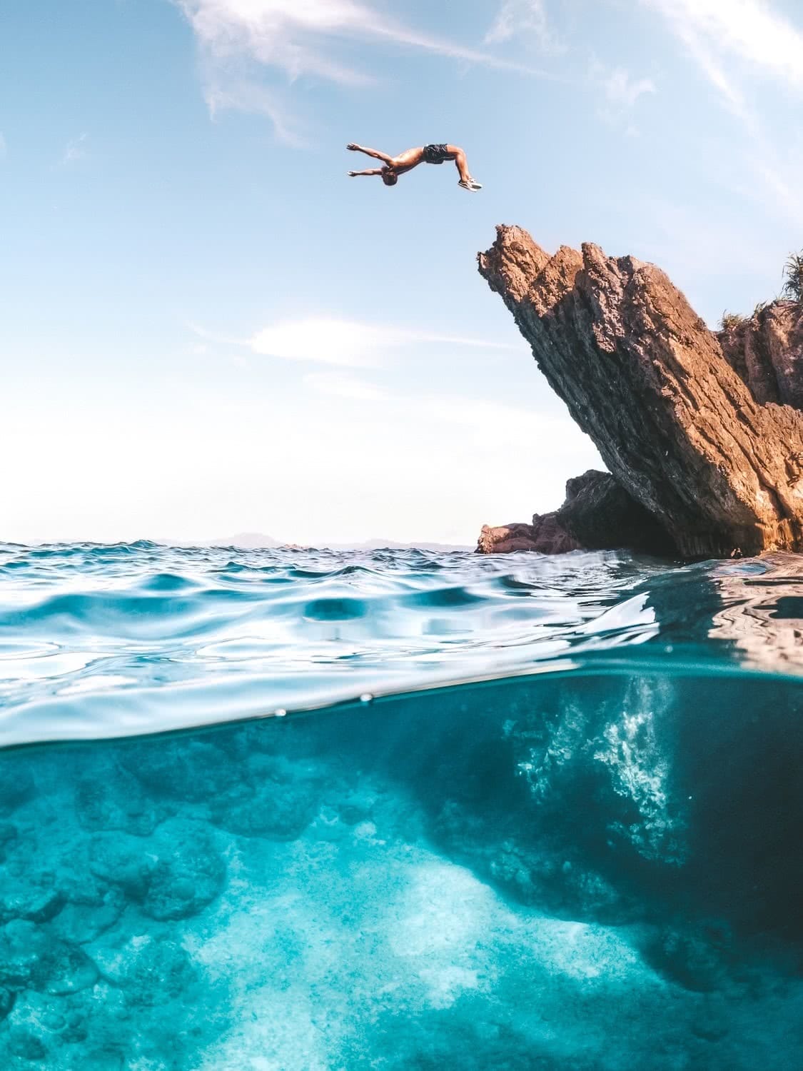 Grab An Adventure Bag And Get Out There! Jackson Groves cliff jump ocean