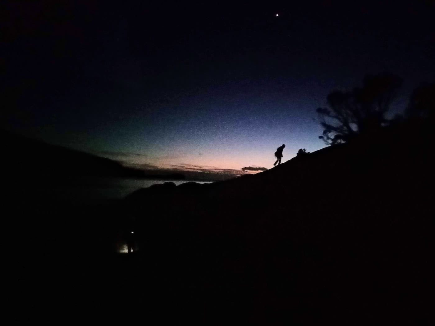 Searching for redemption on the Freycinet Sea Level Traverse, by Polly Barr, sunrise, silhouette of climber