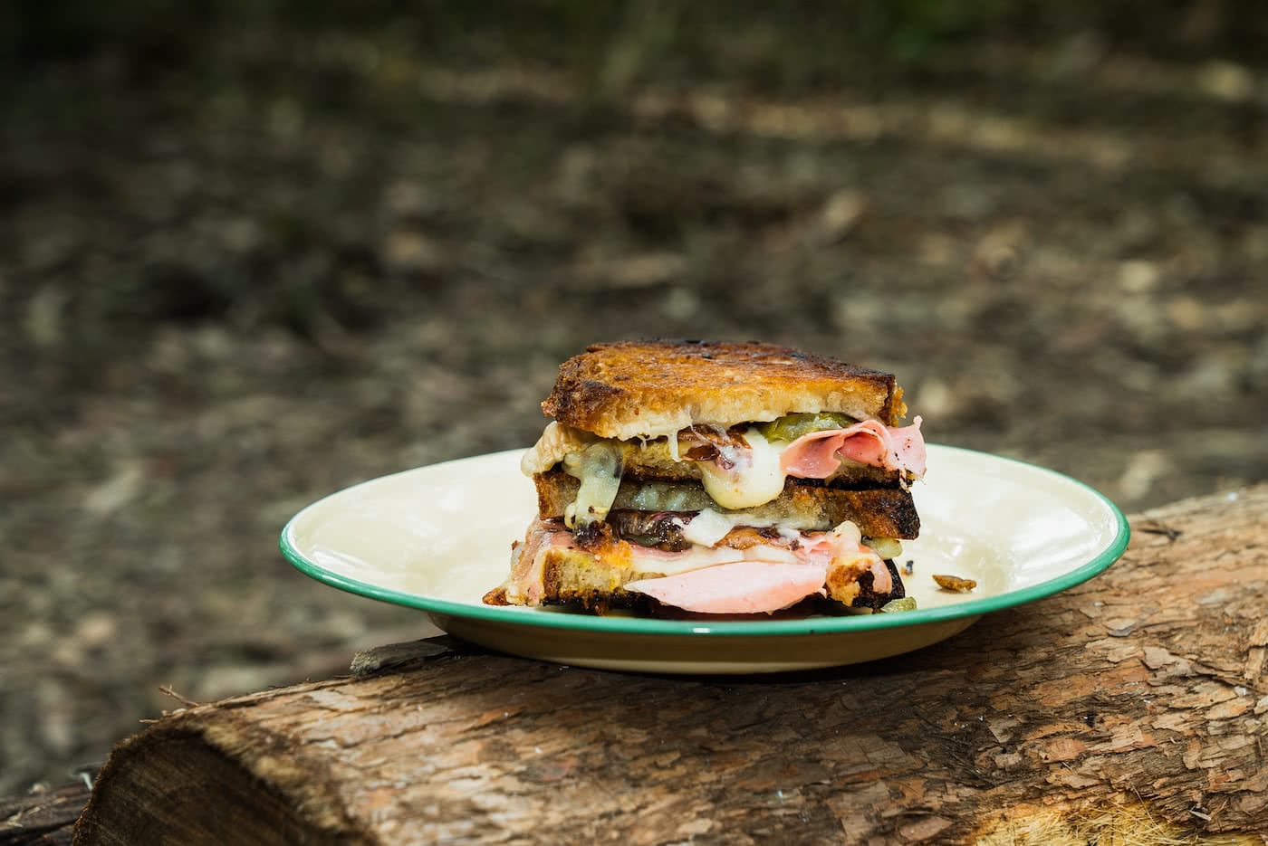 Drool Over This Gourmet Campfire Toastie // Camp Kitchen, Jonathan Tan, sandwich, Cheese, plate, log