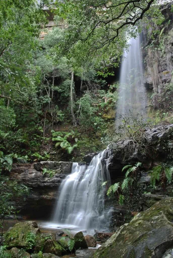 Quiet Weekend Escape In Bottle-Free Bundanoon (NSW), Cara Van Wyk, waterfall, ferns, rocks, moss