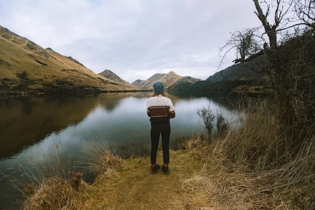 6 Hikes in New Zealand’s South Island We Bet You Haven't Heard Of, Cedric Tang, woman, lake, mountains, beanie
