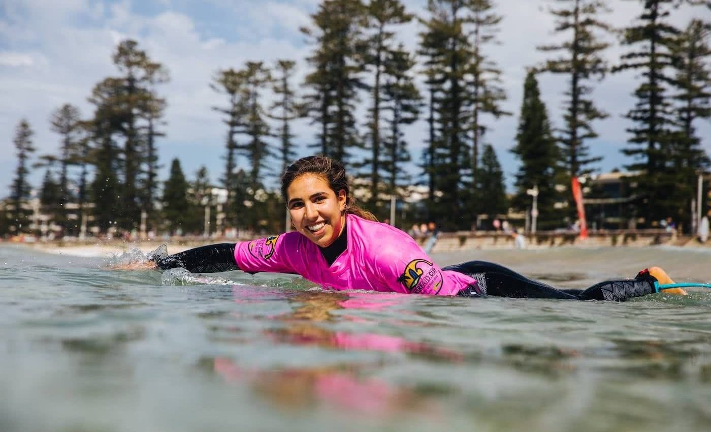 Get Barrelled For Good // Sign Up For The SurfAid Cup, surfing, paddle out, woman, smile