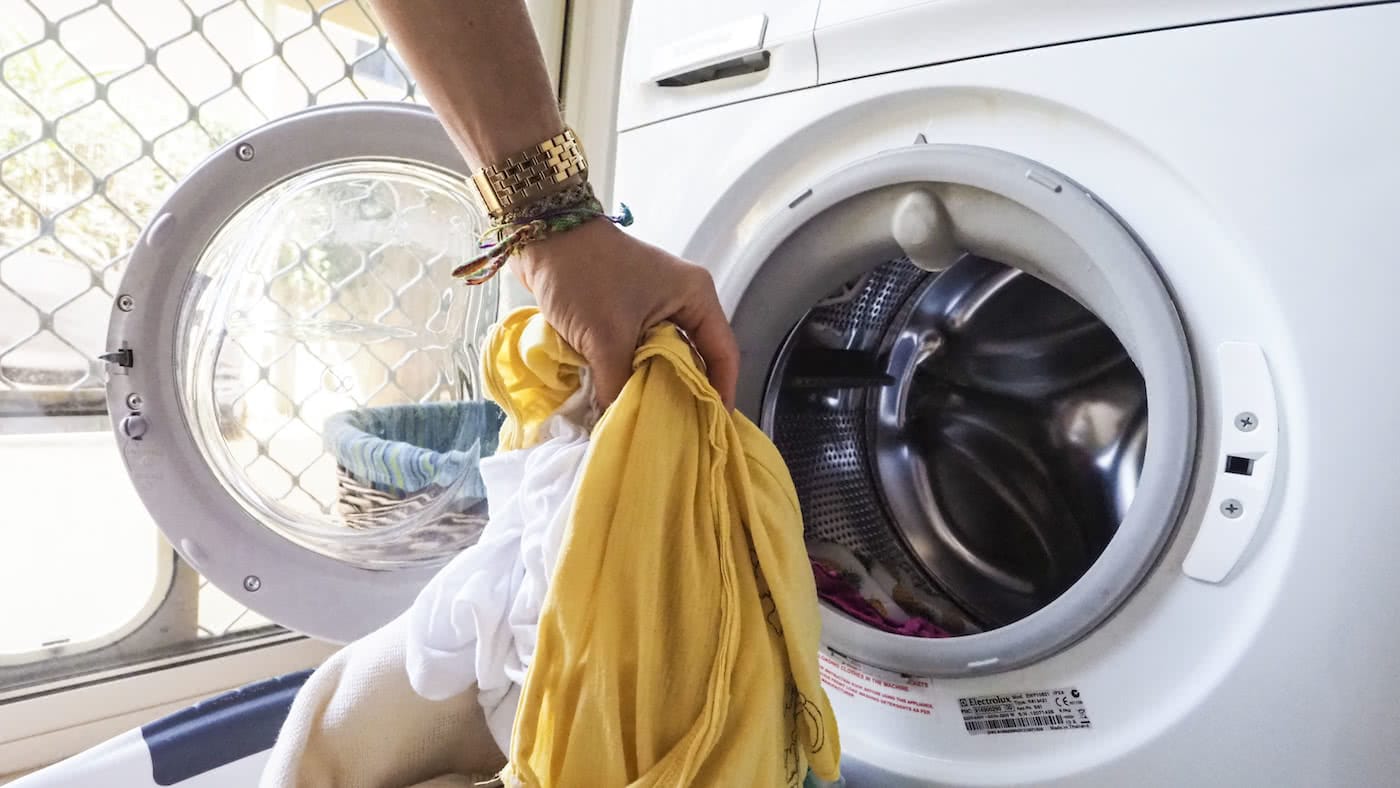 7 Weird Ways You Can Help Save the Planet, photo by Alice forrest, washing machine, dirty clothes