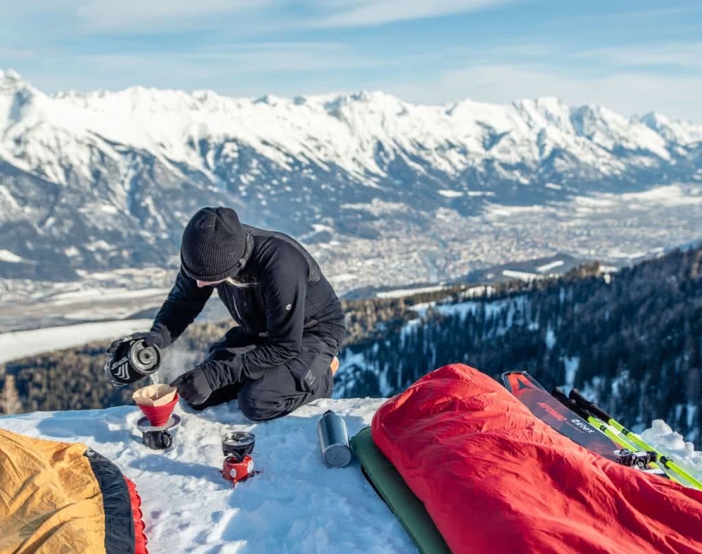 Check Out These Epic Views And Delicious Brews, Tim Sanderson, Innsbruck, sleeping bag, coffee, mountains, snow