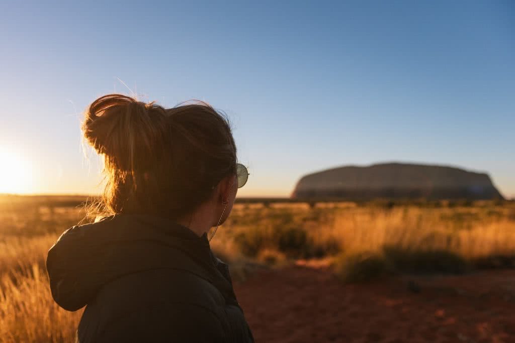 How To Drive From Adelaide To Uluru The Explorer's Way, Adrian Mascenon, Uluru Sunrise, woman, red dirt, desert 