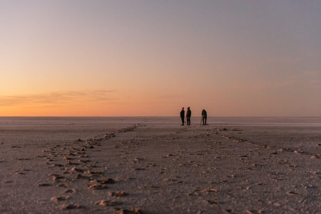 How To Drive From Adelaide To Uluru The Explorer's Way, Adrian Mascenon, Kati Thanda Lake Eyre, sunrise, desert, people