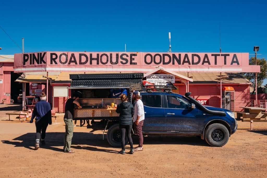 How To Drive From Adelaide To Uluru The Explorer's Way, Adrian Mascenon, Pink Roadhouse Oodnadatta, ute, desert, people, road trip