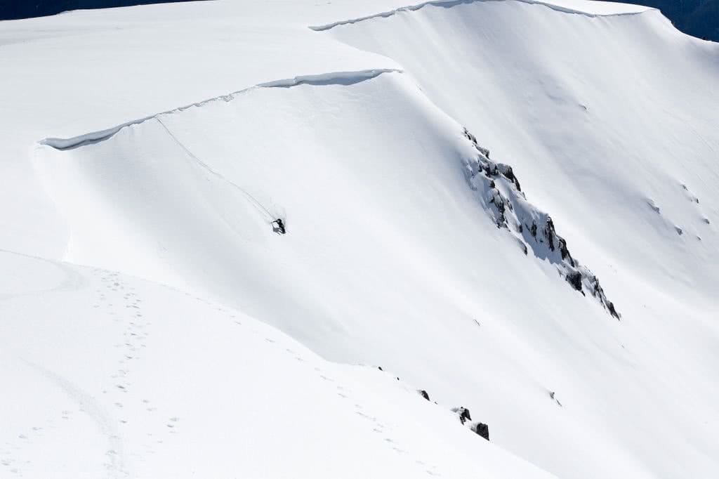 These Ski-Resorts Are Not Doing Business As Usual Anymore, photo by Craig Brokensha, mountain, snow, skier, rocks