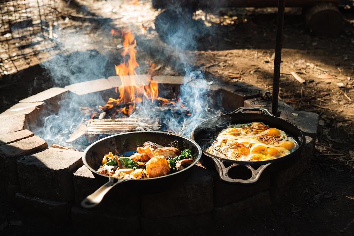 Feed The Camping Masses With This Crispy Eggy Breaky, photo by Jonathan Tan, fry pans, fire, breakfast, eggs