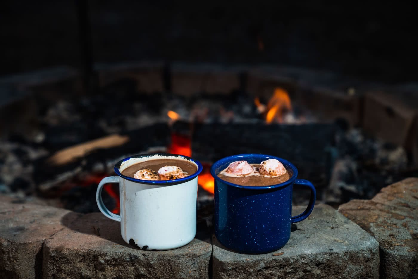 This Boozy Hot Choccy Is The Perfect Nightcap For Camping, photo Jonathan Tan, campfire, cups, hot chocolate, marshmallows
