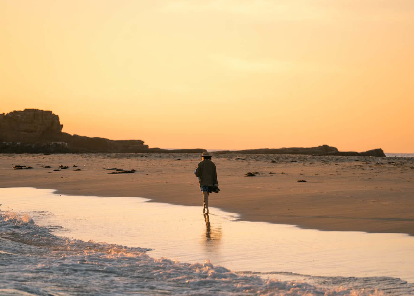 8 Great Reasons To Take Your Mates To Eurobodalla, photo by Fin Matson, Mystery Bay, sunset, orange sky, walking, beach reflection