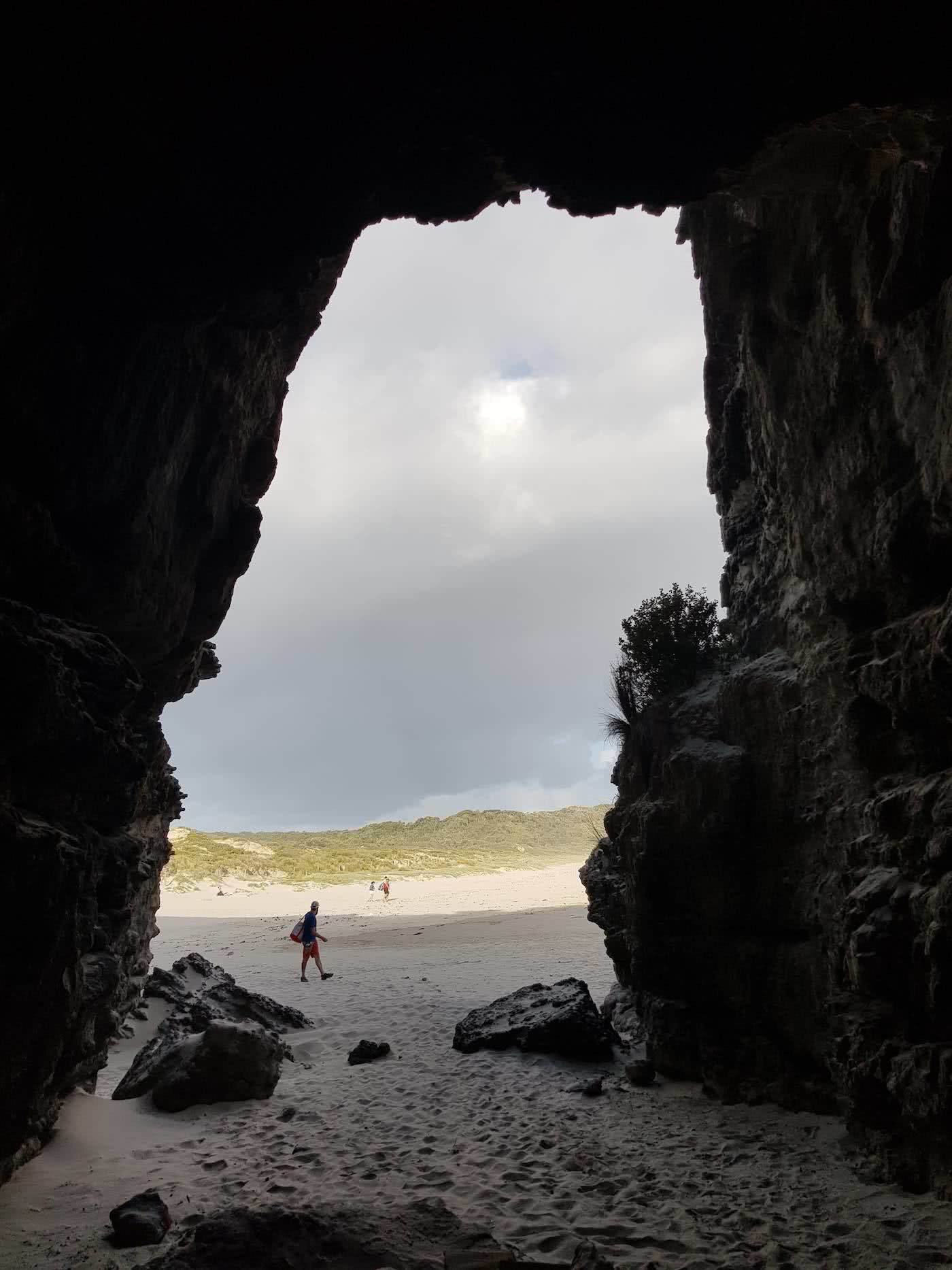 Ditch The Crowds // Cave Beach (ACT), Dan Slater, cave, beach, shadow, man, sky