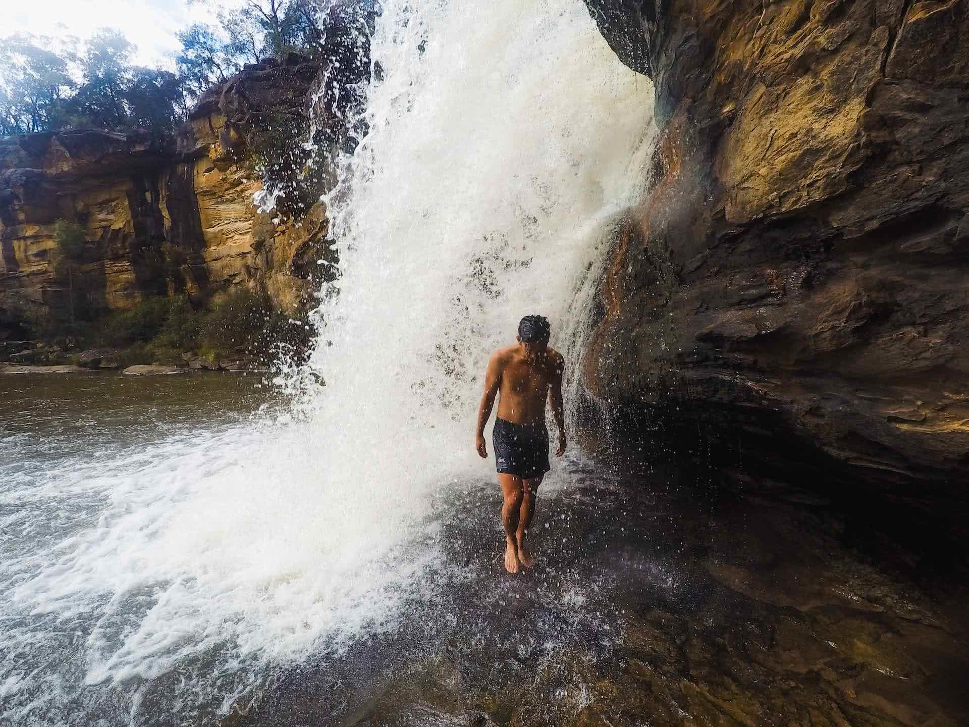 Take The Whole Family To The Mermaid Pools // Tahmoor (NSW), Leonie Waldron, photo by Jonathan Tan, waterfall, rocks, man