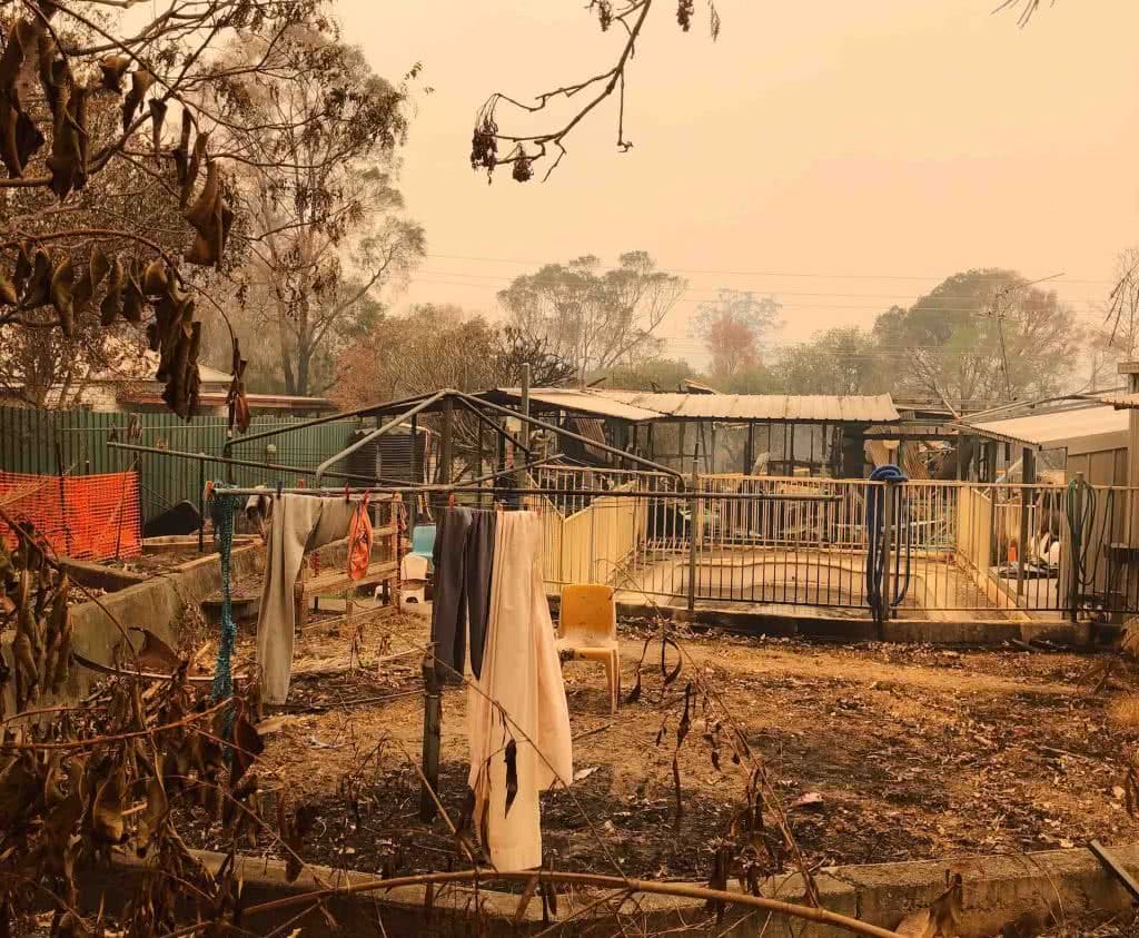 After The Flames – What Does A Bushfire Leave Behind?, Amy Fairall, photo by Anouk Berney, house, clothesline, clothes, burnt, smoke