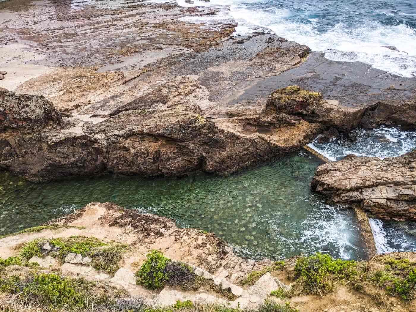 Swim In One Of These Illawarra Ocean Pools This Summer, Amy Fairall, Wollongong Nun's Baths, ocean, pool, rocks, headland, waves