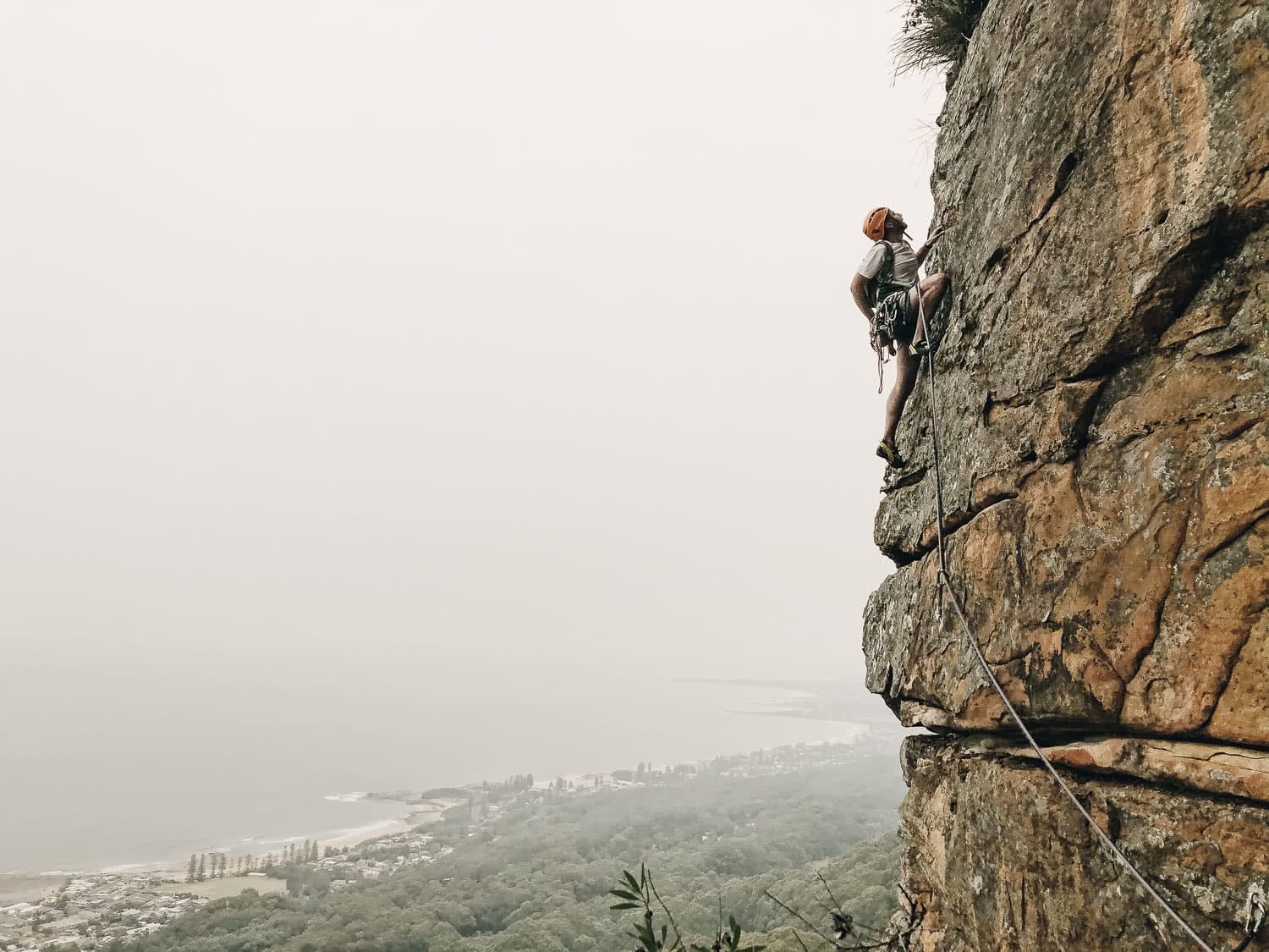 adventure is a privilege, photo by tim ashelford, aidan howes climbing 2 guys, one skyhook in the illawarra, sport climbing, NSW