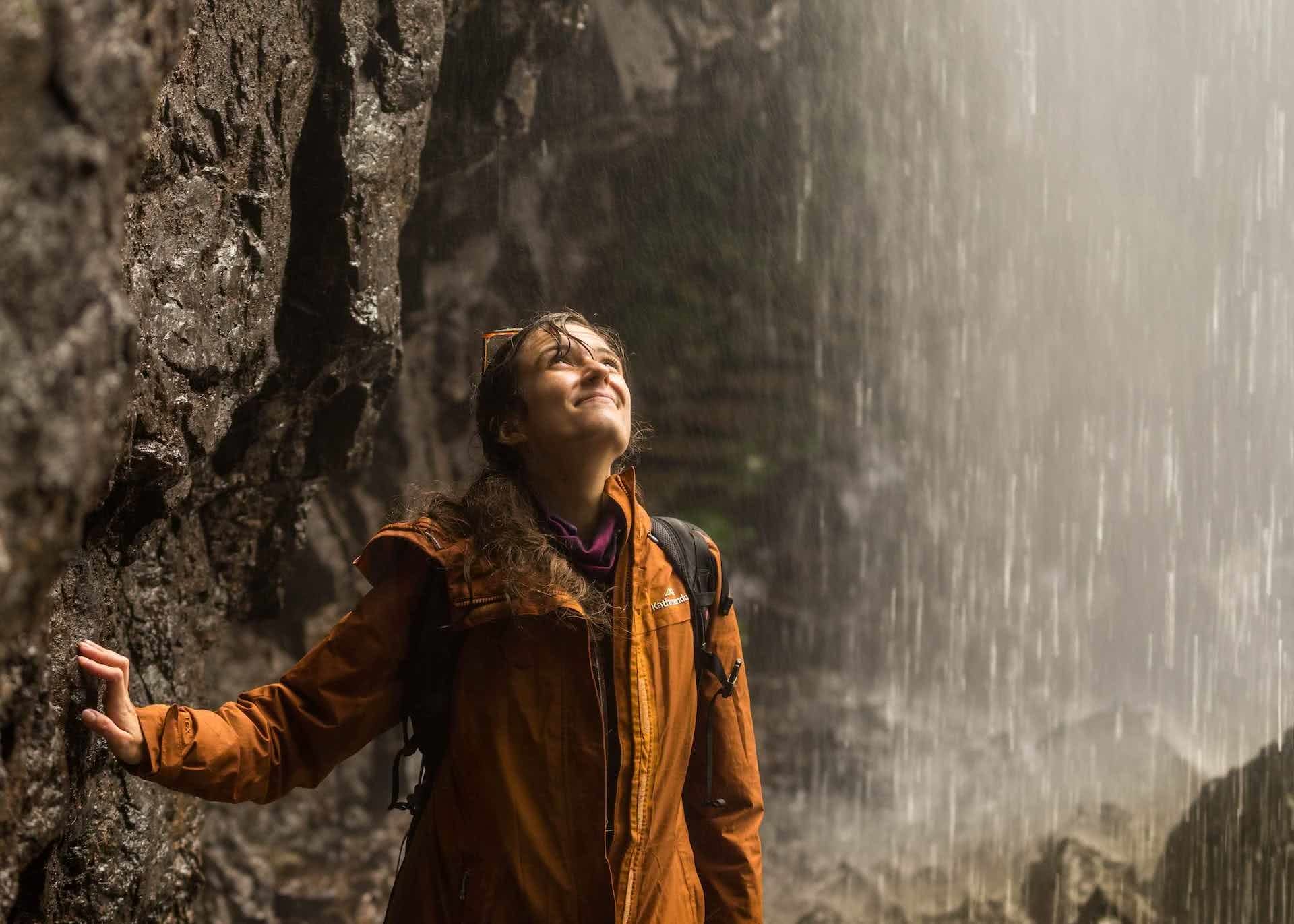 Twin Falls Circuit is the Perfect Rainy Day Hike // Springbrook National Park (QLD), Saphira Schroers, photo by Miranda Fittock, woman, waterfall, hike, rain, jacket