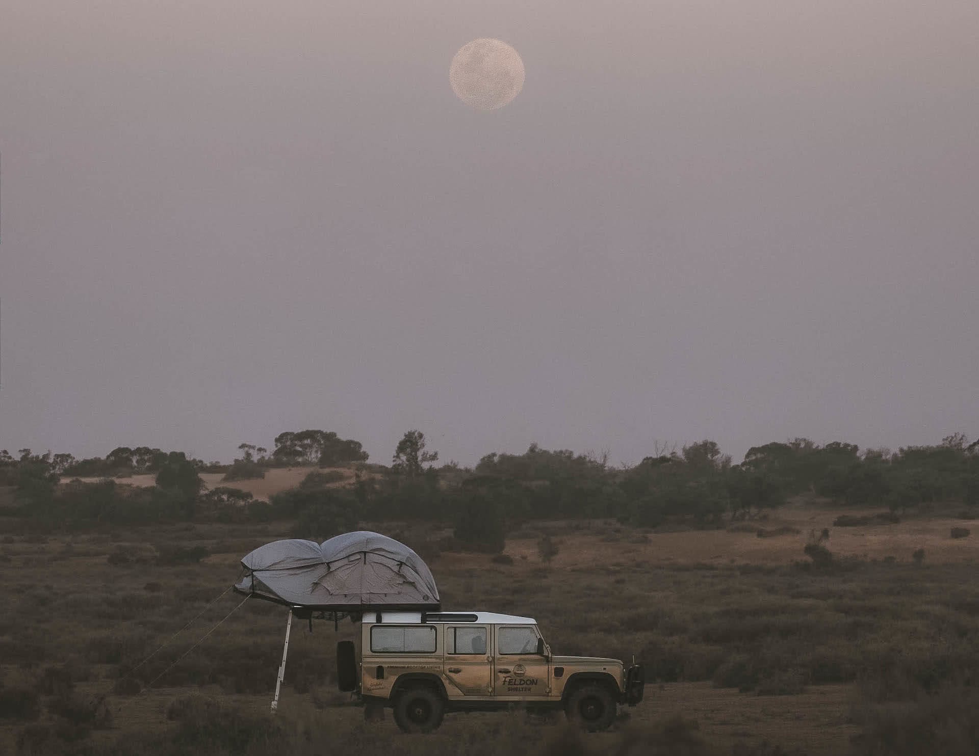 There's a Story Behind Every Photo: Adventure Photographer Fin Matson, photo by Fin Matson, Jono Tan, jeep, car, moonrise, outback, roof top tent, camping